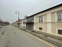 A two-story house n the center of Guba, on H. Aliyev avenue, -2