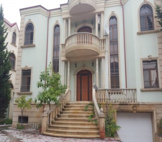 a newly built 2-storey + basement, 8-room mansion villa in Baku center, -1