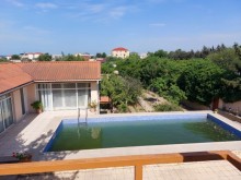 A house with a swimming pool is for sale in Novkhani in an array of courtyard houses and gardens
, -15