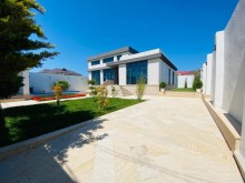 A villa with a beautiful yard and swimming pool is for sale in Mardakan
, -4