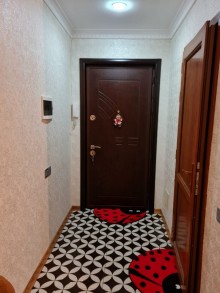 A 3-room apartment is for sale in Bakhihanov, -13