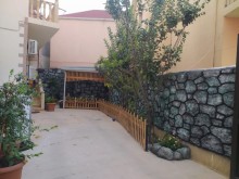 A 2-story house is for sale in Khirdalan, close to the school and bus stop, -5