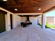A 1-story villa with a seat is for sale in baku mardakan, -6