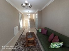 A villa with a garden is for sale in Baku Novkhani, -17