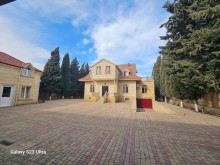 A house is for sale in the Novkhani village of Baku, -18