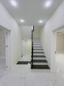 A 2-storey house is for sale in the Mardakan village of Baku, -18