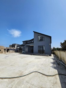 A new house with a sea view is for sale in Baku in Shuvelan settlement. House 5 rooms, -8