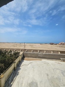 A new house with a sea view is for sale in Baku in Shuvelan settlement. House 5 rooms, -13