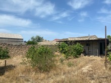 Shuvelanda Torpaq almaq merkezi yoldan texminen 250-300 metre iceride, -2