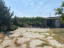 Shuvelanda Torpaq almaq merkezi yoldan texminen 250-300 metre iceride, -14