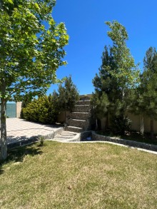 A house with a sea view is for sale in Turkan settlement, Baku city. The 2-storey, -2