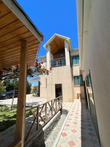 A house with a sea view is for sale in Turkan settlement, Baku city. The 2-storey, -7
