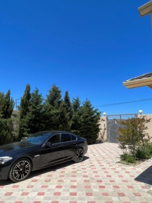 A house with a sea view is for sale in Turkan settlement, Baku city. The 2-storey, -13
