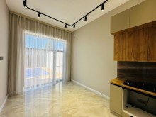 A new modern house with a swimming pool is for sale in Baku on the Shuvelan Park road, -11