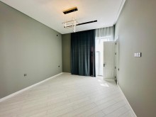 A new modern house with a swimming pool is for sale in Baku on the Shuvelan Park road, -19