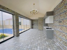 A modern villa is for sale in Baku, located in the Shuvulan, -2