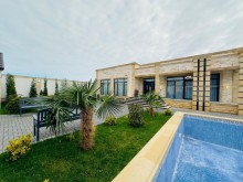 A modern villa is for sale in Baku, located in the Shuvulan, -3