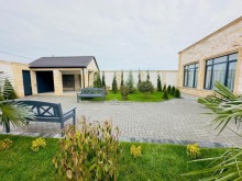 A modern villa is for sale in Baku, located in the Shuvulan, -8