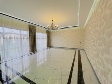 A modern villa is for sale in Baku, located in the Shuvulan, -9