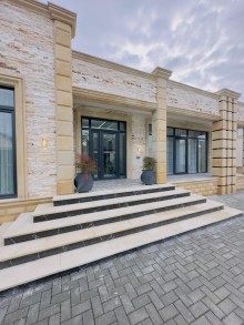 A modern villa is for sale in Baku, located in the Shuvulan, -10