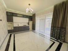 A modern villa is for sale in Baku, located in the Shuvulan, -12