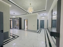 A modern villa is for sale in Baku, located in the Shuvulan, -13