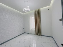 A modern villa is for sale in Baku, located in the Shuvulan, -14