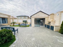 A modern villa is for sale in Baku, located in the Shuvulan, -15