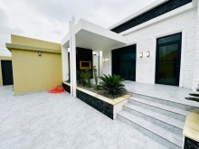 Mərdəkan qəsəbəsində 4 sot torpaq sahəsində yerləşən 1 mərtəbəli, modern satılır, -2