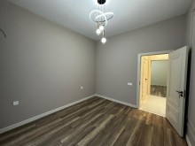 Mərdəkan qəsəbəsində 4 sot torpaq sahəsində yerləşən 1 mərtəbəli, modern satılır, -13